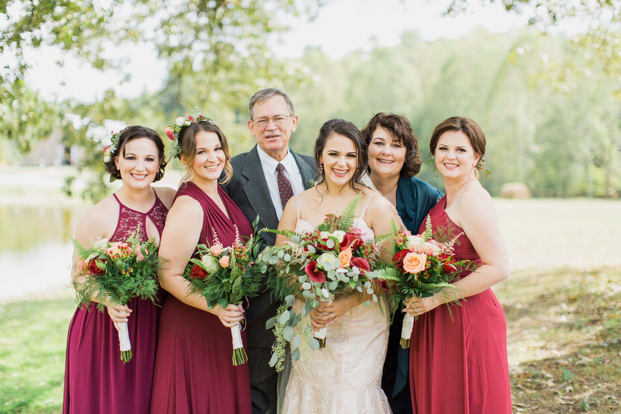 Bride and family with bouqet in ellijay georgia at deep south farm